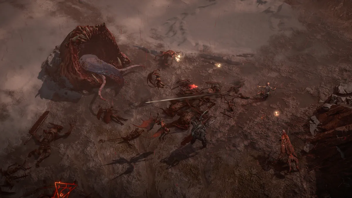 A player fights a large pack of demons on scorched red ground inside a Diablo 4 Helltide