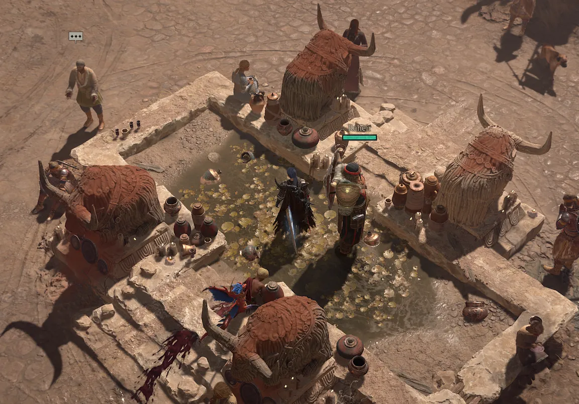 Shallow square fountain in Ked Bardu in Diablo 4 with four large ox statues on its stone rim
